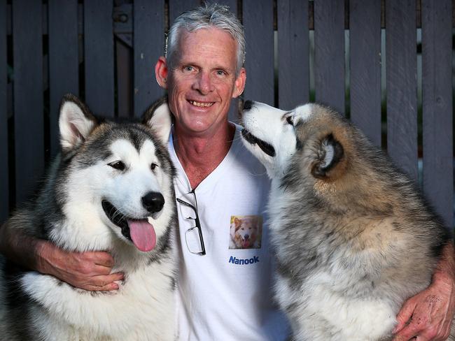 Pet obit's are becoming more common. Gavin Devine with his young dogs Mya and Sam. Gavin has made a website to commemorate his Delta Therapy Dog Nanook who passed suddenly last year. People share their memories with Nanook on the site. Pics Adam Head