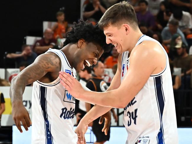 CAIRNS, AUSTRALIA - JANUARY 19:  Dejan Vasiljevic of the 36ers reacts with teammate Kendric Davis after winning  the round 17 NBL match between Cairns Taipans and Adelaide 36ers at Cairns Convention Centre, on January 19, 2025, in Cairns, Australia. (Photo by Emily Barker/Getty Images)