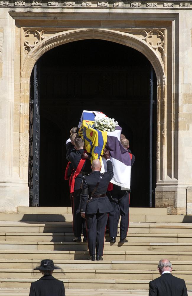 WINDSOR, ENGLAND - APRIL 17: Princess Anne, Princess Royal and Prince Charles, Prince of Wales follow Prince Philip, Duke of Edinburgh's coffin as it is carried in to St George's chapel Picture: Getty Images