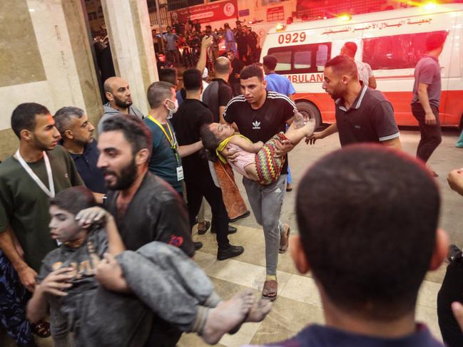 Palestinians injured in Israeli air raids arrive at Nasser Medical Hospital in Khan Yunis, in the southern Gaza Strip, Gaza. Picture: Getty Images