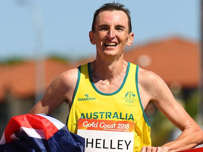 GOLD COAST, AUSTRALIA - APRIL 15:  Michael Shelley of Australia celebrates as he crosses the line to win gold in the Men's marathon on day 11 of the Gold Coast 2018 Commonwealth Games at Southport Broadwater Parklands on April 15, 2018 on the Gold Coast, Australia.  (Photo by Matt Roberts/Getty Images)