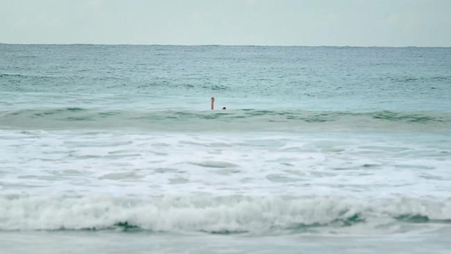 The video depicts an Abbott impersonator refusing to rescue a drowning swimmer