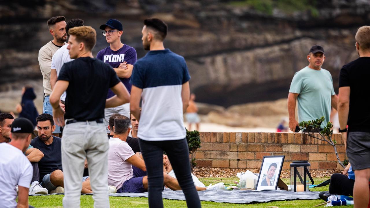 Friends chatted among themselves during the vigil. Picture: NCA NewsWire/ Ben Symons