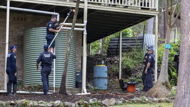 Police divers at the property from which William Tyrrell disappeared. Picture: Liam Mendes