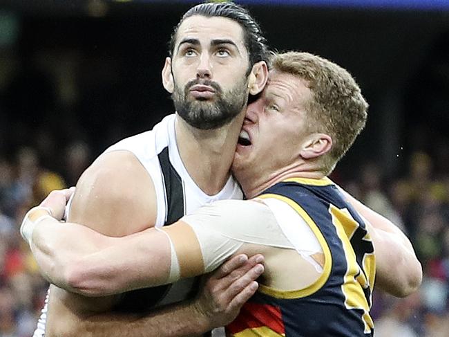 Brodie Grundy outpointed Reilly O'Brien and Sam Jacobs. Pic: SARAH REED