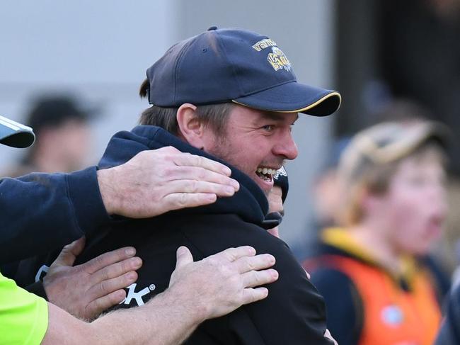 Whittlesea coach Jim Atkins' smile on the final siren as his team snaps an 11-game losing streak by beating Montmorency. Picture: Nathan McNeill.