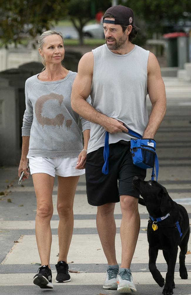 Sascha Daisley, pictured with Tom Webb and their dog Jetson, doesn’t want apartment blocks being built in Mosman. Picture: Brendan Read