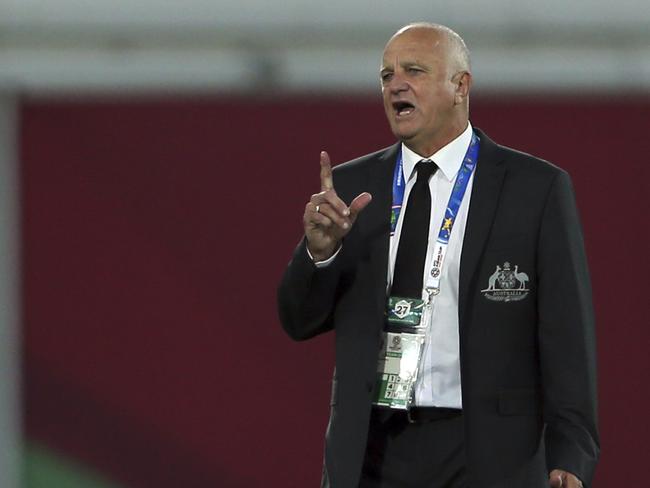 Australia's head coach Graham Arnold gives instructions to his players during the AFC Asian Cup group B soccer match between Australia and Syria at the Khalifa bin Zayed Stadium in Al Ain, United Arab Emirates, Tuesday, Jan. 15, 2019. (AP Photo/Kamran Jebreili)