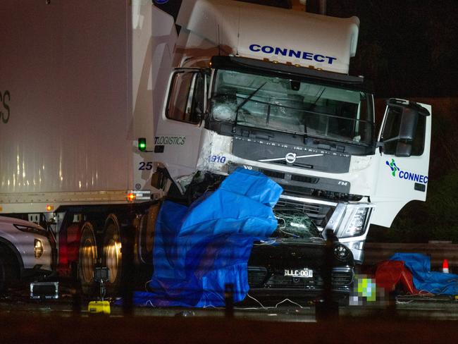 Four Victoria Police officers have been killed and a man is on the run after an accident on the Eastern Freeway near the suburb of Kew. A multi vehicle car accident involving a truck and Victoria Police on the Eastern Freeway between Chandler Hwy and Burke Road. Picture: Mark Stewart