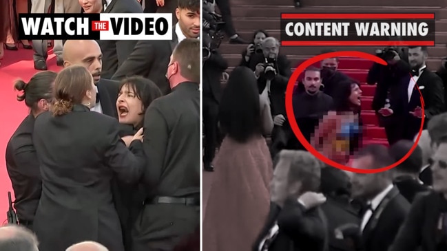 Topless, screaming protester crashes red carpet at Cannes Film Festival