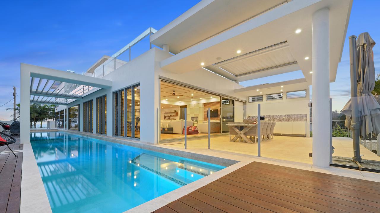 This stunning Kings Beach mansion at 15B Burgess Street is being marketed by Henzells with offers over $7m being sought.