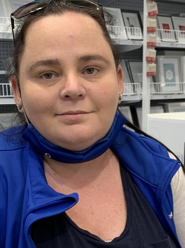 Jodi Rowe, of Lismore, is grateful to be back on deck as Officeworks reopens six months after catastrophic floods in February.