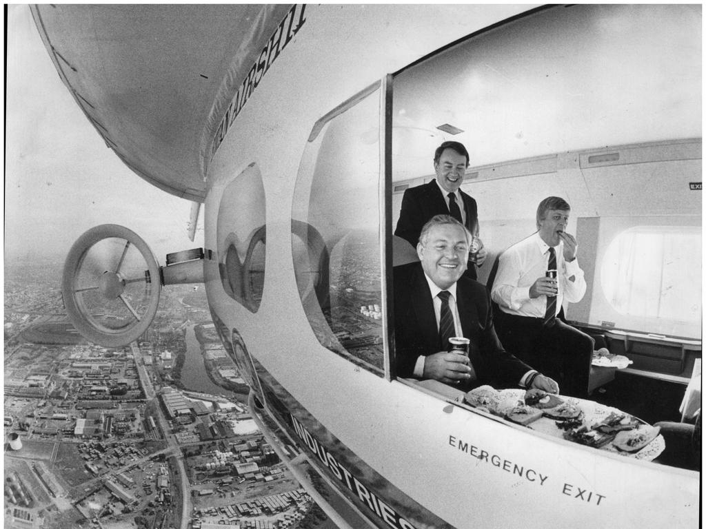 On top of the world ... Businessman Alan Bond, pictured in a light aircraft in 1986.