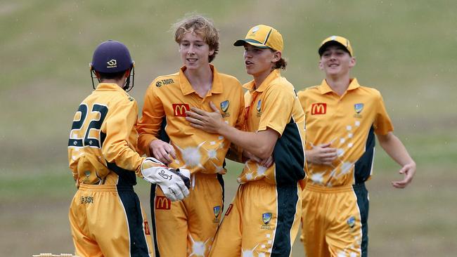 Lachlan Carlyle (centre) played a key role in North Coastal’s final-over win. Picture: John Appleyard