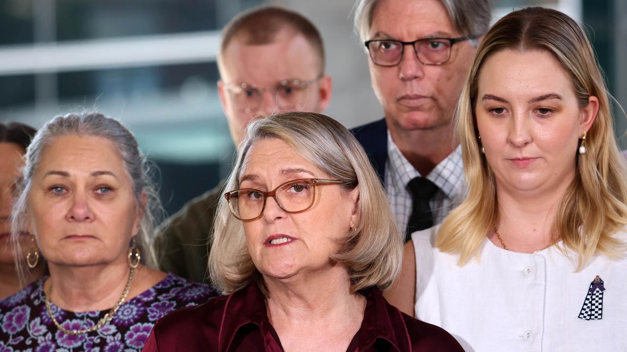 Matthew Arnold’s mother, Sue Arnold, centre, reads a media statement at the Brisbane Magistrates court. Picture: NewsWire/Tertius Pickard