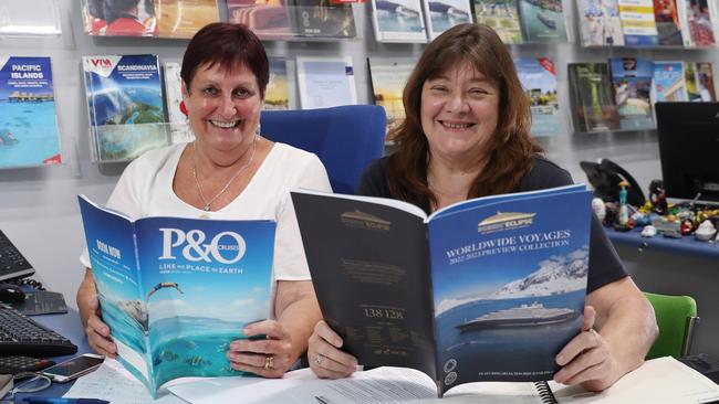 Senior consultant at Endeavour Travel and Cruise Jenny Christensen and manager Jill Faircloth are ready to book travel hungry Cairns residents back onto cruises. Picture: Brendan Radke