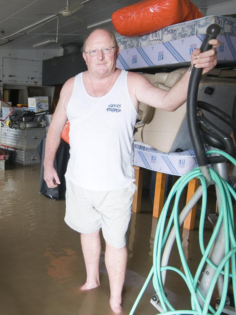 Sid McKeown managed to get some of his furniture and equipment above flood waters at his fishery business during the 2010/11 floods. Mr McKeown stands by recent comments from Hinkler MP Keith Pitt, who said a proposed flood levee would divide the community.Pic John Wilson Story Kristen Shorten