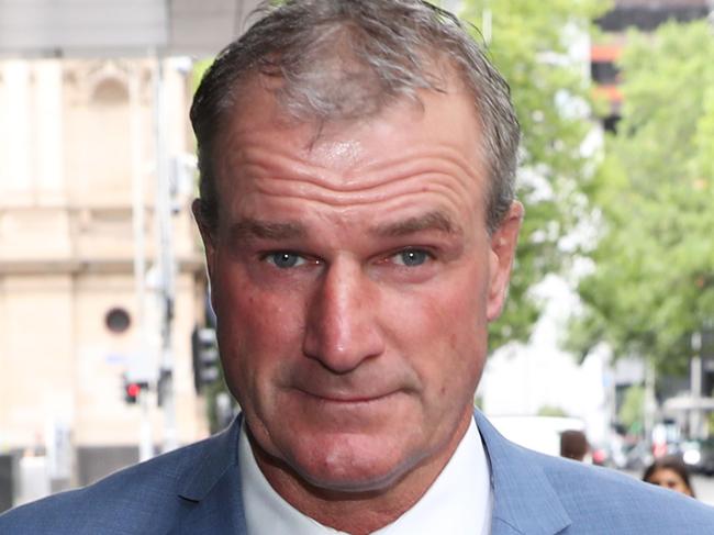 Darren Weir leaves the County Court of Victoria in Melbourne, Friday, February 14, 2020. Disqualified horse trainers Jarrod McLean, Darren Weir, and stablehands William Hernan and Tyson Kermond face charges of animal cruelty and conspiracy offences. (AAP Image/David Crosling) NO ARCHIVING