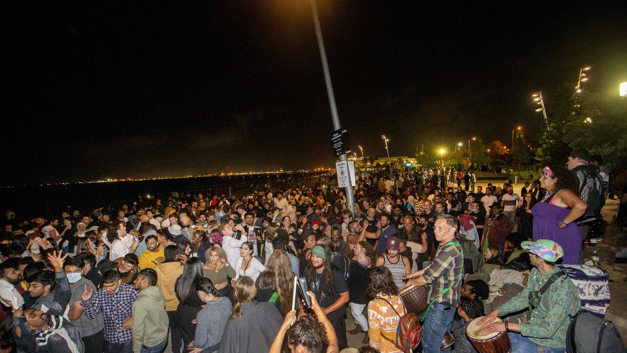 There are fears that New Year’s Eve will be a super spreader event for the Omicron Covid-19 strain. Revellers celebrating NYE on St Kilda Beach in 2020. Picture: David Geraghty