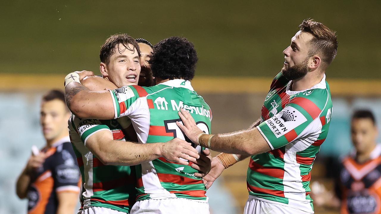 SYDNEY, AUSTRALIA – JULY 04: Cameron Murray of the Rabbitohs celebrates with teammates after scoring a try during the round 16 NRL match between the Wests Tigers and the South Sydney Rabbitohs at Leichhardt Oval on July 04, 2021, in Sydney, Australia. (Photo by Mark Kolbe/Getty Images)