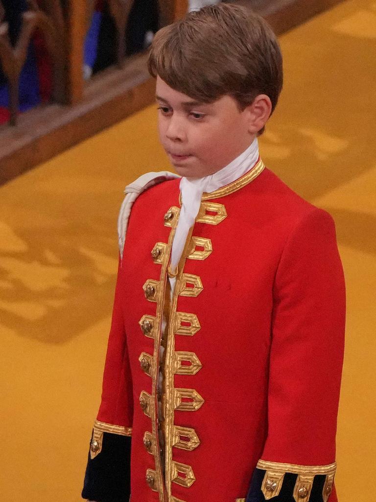 Prince George of Wales holds the robe of King Charles III at Westminster Abbey. Picture: Aaron Chown / POOL / AFP