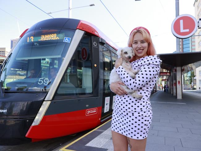 Katie Wheatley and her dog Bella at Central Station. Picture: Tim Hunter.