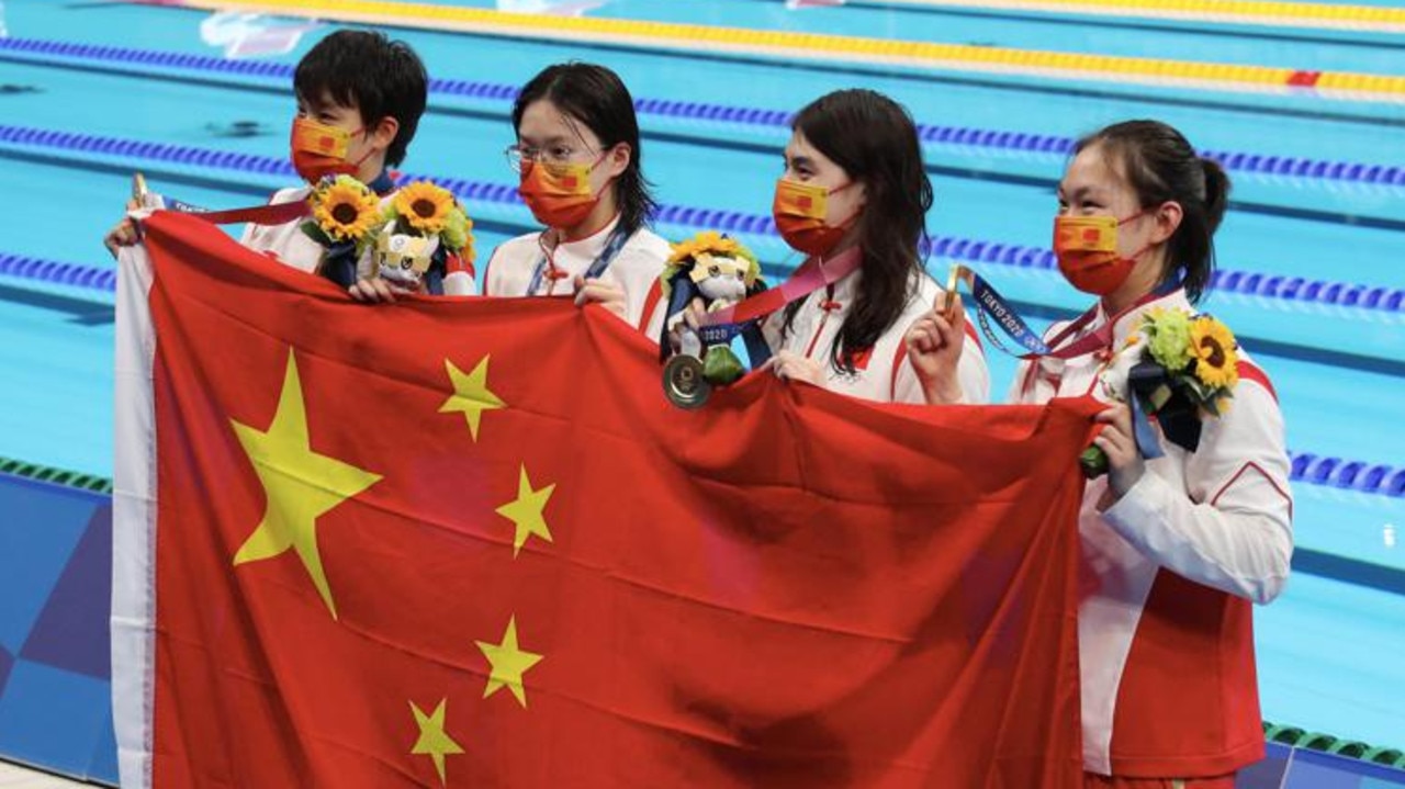 TOKYO,JAPAN - JULY 29: Gold medalist Junxuan Yang, Yufei Zhang, Bingjie Li and Muhan Tang of Team China pose with their gold medals for the Women's 4 x 200m Freestyle Relay Final on day six of the Tokyo 2020 Olympic Games at Tokyo Aquatics Centre on July 29, 2021 in Tokyo, Japan. (Photo by Xavier Laine/Getty Images)