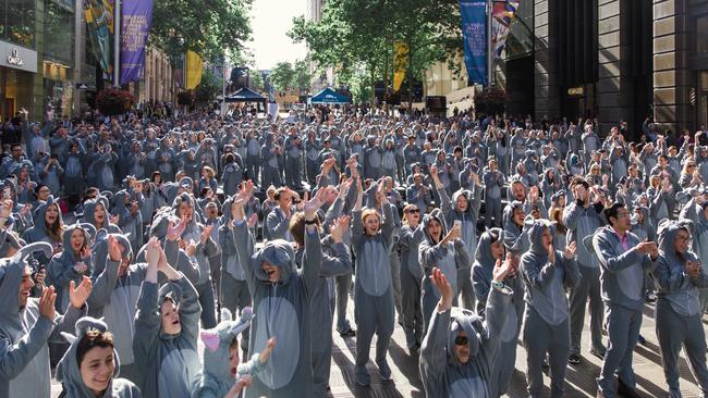 504 people turned up to Martin Place Amphitheatre Friday morning to smash a world record for most people dressed as elephants. Picture: Supplied