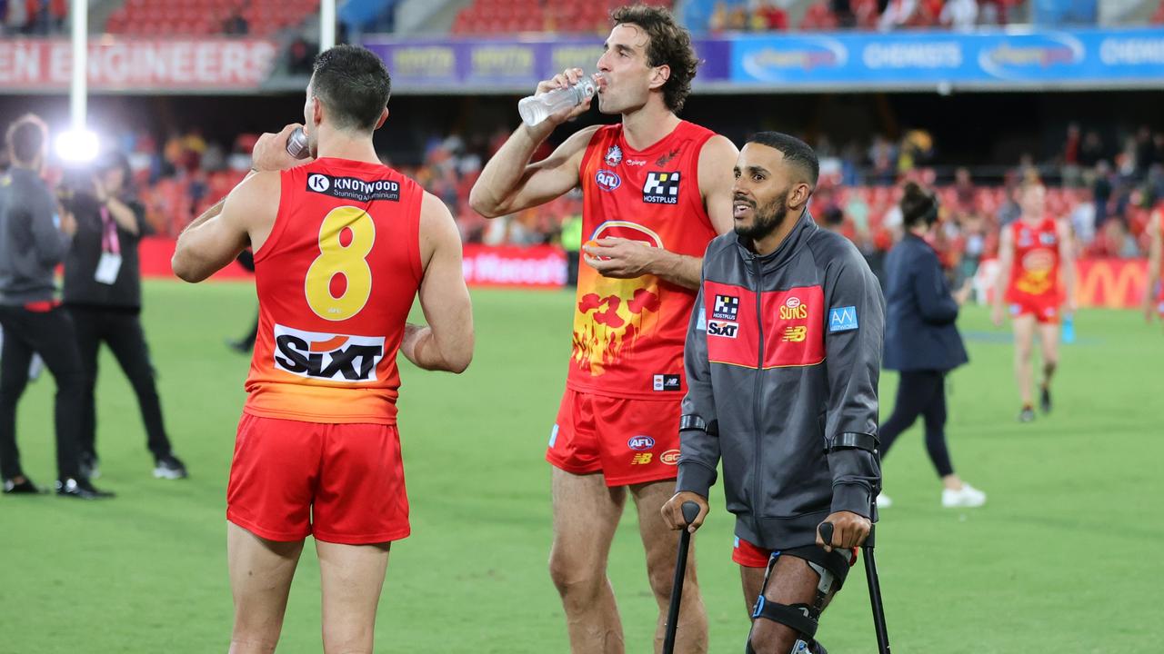 An injured Touk Miller of the Gold Coast Suns. Picture: Russell Freeman/AFL Photos via Getty Images