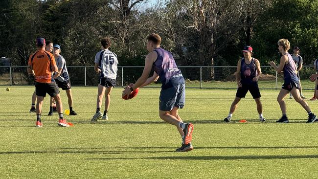 Damian Mascitti takes a kick at training. Picture: Simon McEvoy