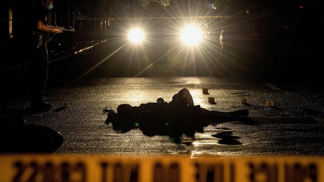 Two alleged drug dealers were gunned down by unidentified men in Manila. Picture: AFP / Noel Celis.