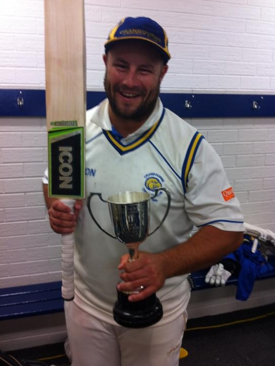 Polson after making a century for Cranbourne in the 2013-14 grand final.