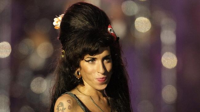 Amy Winehouse performs during a concert in honour of Nelson Mandela's 90th birthday in Hyde Park in London in 2008. Picture: AFP