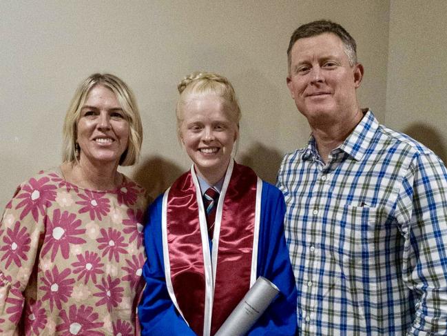 Travis McCombe (right) with daughter Sammy and wife Kelli. Picture: Supplied