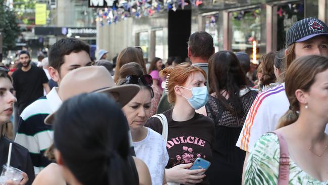 People have been urged to wear a mask at gatherings, or even get other people to go shopping for them if they are feeling unwell. File picture