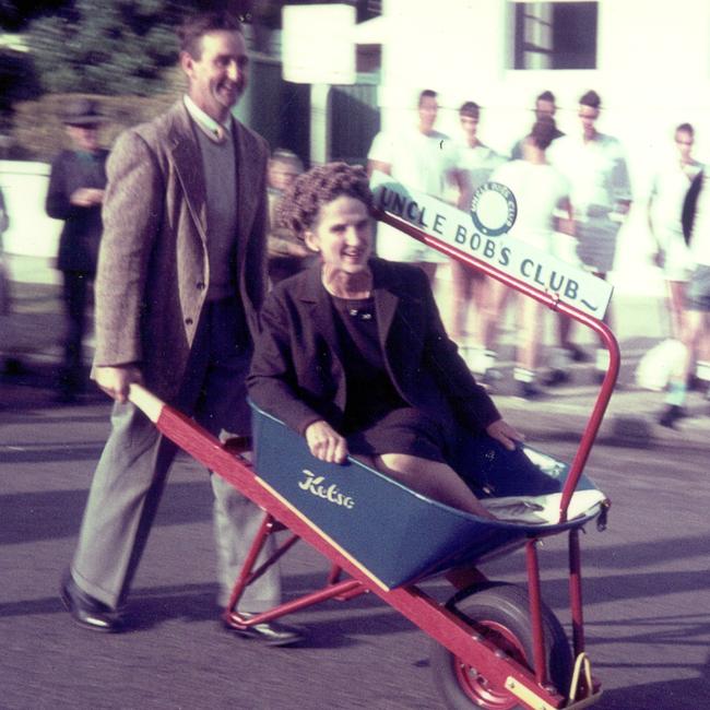 Dame Elisabeth Murdoch in a wheelbarrow for a fundraiser for the Uncle Bobs Club for the Good Friday Appeal.