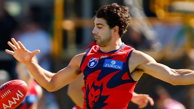 PERTH, AUSTRALIA - MARCH 02: Christian Petracca of the Demons clears the ball from the centre during the 2025 AAMI AFL Community Series match between Fremantle Dockers and Melbourne Demons at Rushton Park on March 02, 2025 in Mandurah, Australia. (Photo by James Worsfold/AFL Photos/via Getty Images)