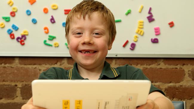 Eltham North Primary School student Sam uses the TALI Train program. Picture: Hamish Blair