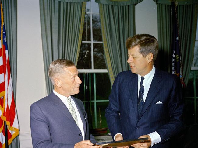 President Kennedy in the Oval Office with the Australian, Reg Evans, who saved his life during WWII.