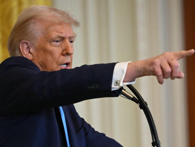 TOPSHOT - US President Donald Trump speaks during a press conference with unseen Israel's Prime Minister Benjamin Netanyahu in the East Room of the White House in Washington, DC, on February 4, 2025. (Photo by ANDREW CABALLERO-REYNOLDS / AFP)