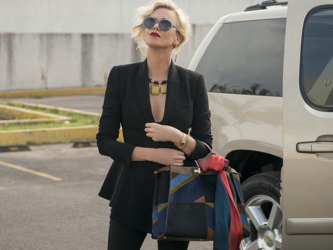 Charlize Theron plays corporate nightmare Elaine in Gringo.