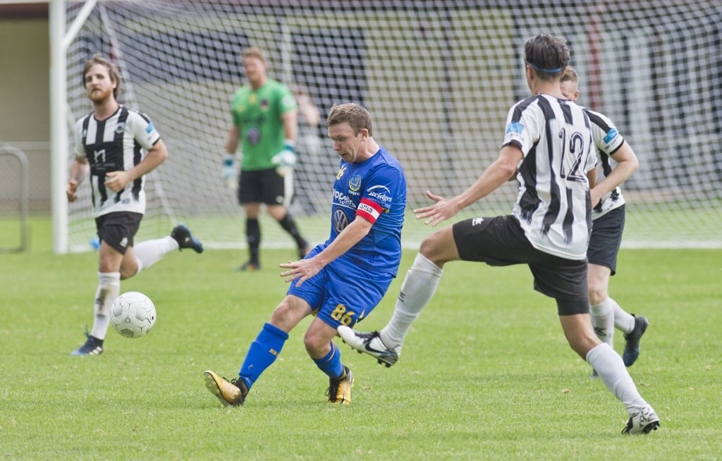 Brendan Willmot, USQ. Football, Willowburn vs USQ. Sunday, 4th Mar, 2018. Picture: Nev Madsen