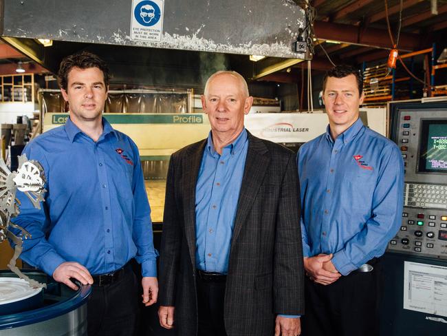 Ron Thomson and his sons, Lawrence, left, and Muir, who run Laser Wizard Sydney at their St Mary’s factory / Picture: Jonathan Ng