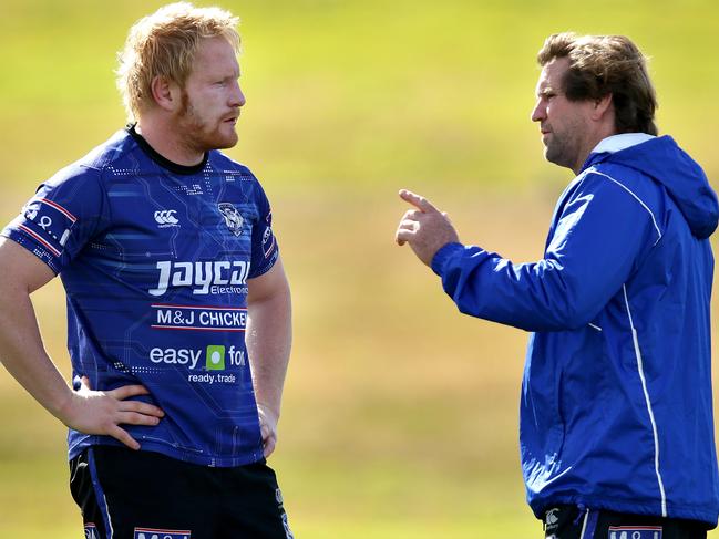 Former Bulldog James Graham talks with coach Des Hasler during his tenure at the club. Picture Gregg Porteous