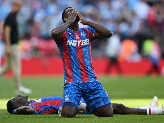 LONDON, ENGLAND - MAY 17: Marc Guehi and Ismaila Sarr of Crystal Palace celebrate victory following the Emirates FA Cup Final match between Crystal Palace and Manchester City at Wembley Stadium on May 17, 2025 in London, England. (Photo by Shaun Botterill/Getty Images)