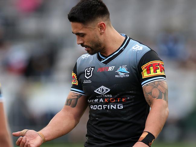 Cronulla’s Shaun Johnson looks as his arm where he was allegedly bitten by Kevin Proctor. Picture. Phil Hillyard