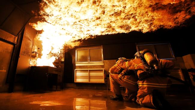 MFB firefighters, pictured here in training, are facing mental health pressures in the workplace. Picture: David Caird.