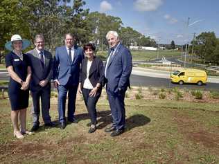 OPENING: Standing at the Griffiths St roundabout which forms part of the Toowoomba bypass connection are (from left) Department of Transport and Main Roads Regional Director Kym Murphy, Member for Groom John McVeigh MP, Assistant Minister for roads and transport Scott Buchholz, TRC Deputy Mayor Carol Taylor and TRC Mayor Paul Antonio. Picture: Bev Lacey