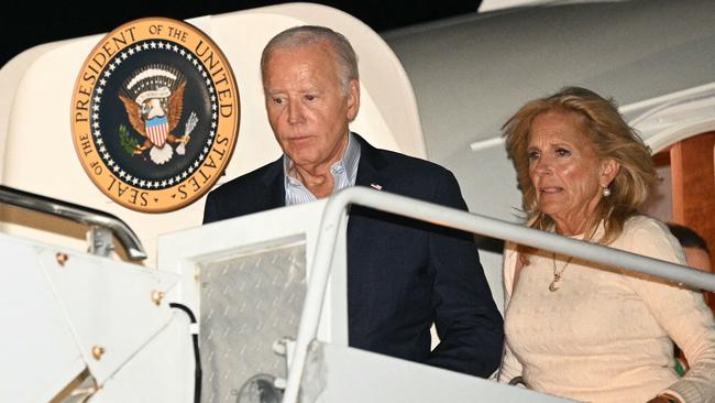 US President Joe Biden and First Lady Jill Biden step off Air Force One at Hagerstown Regional Airport in Maryland, en route to Camp David. Picture: Mandel Ngan / AFP