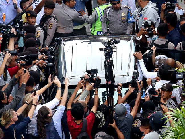 Media surrounding Corby’s vehicle after she was released on parole. Picture: Lukman S. Bintoro